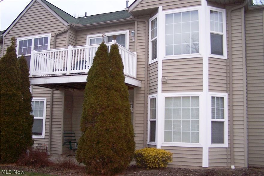 Downsizing or just a new chapter in your life? Enjoy a wonderful condo lifestyle in Sagamore Hills! Residents have access to the Exercise Room, Tennis Courts, 2 Swimming Pools (1 indoor & 1 outdoor). You'll also appreciate coming home and pulling into your 2 car Garage then coming right into the building without enduring the elements (before going to the second floor to your unit). Entertain your guests in the lovely decorated Living Room with a Gas Fireplace in the Living Room or spill into the dining Room for a nice dinner. Whether cooking a simple meal, setting up a buffet or creating a gourmet dinner, you'll be able to converse with your guests in the Cute Galley Kitchen with appliances (brand-new refrigerator, range, microwave, dishwasher and garbage disposal) via the window-type opening to the Dining Room area. A few steps away, your guests would have access to a full bathroom (sink/vanity, tub/shower and toilet. Or enjoy the balcony deck during those warm balmy evenings. Owner's suite includes expansive closet and full bath (tub, shower, sink/vanity and toilet). Second bedroom with nice size closet can used for a family member a guest or perhaps a home office. This unit also includes a Laundry Room (washer and dryer included). Don't wait! Call today for your private showing.