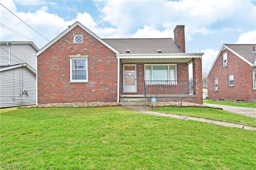 This adorable brick cape cod home on Youngstown's south side is ready for you! Welcome to 1123 Detroit Avenue! Step on to the welcoming, covered front porch and enter into the light filled living room. This space features original hardwood flooring and a beautiful stone fireplace! The eat in kitchen is steps away with loads of hardwood cabinetry, plenty of counter space and low maintenance laminate flooring with appliance that remain! Just down the hall you will find 2 large bedrooms with ample closet space and a full bath. Upstairs, the layout allows for an office/den/game area as well as a large bedroom. The basement is home to another full bath and plenty of room for storage, more living space, a workout area etc. This level is also home to laundry services and mechanicals. Outside is a sizeable garage with an attached shed, perfect for storing lawn equipment! What are you waiting for? Call today for your personal tour! **Roof, Furnace, AC, Blown-in insulation 2014**