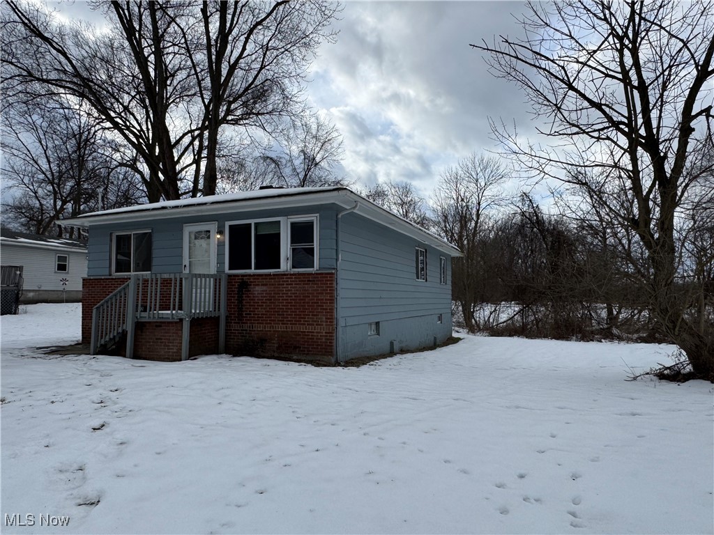 Welcome to 1052 Yukon Ave, Akron, OH, a 3-bedroom, 2-bathroom ranch with endless potential! Conveniently situated near highways, shopping, schools, and more, this home offers both accessibility and opportunity. Featuring a spacious layout, this property is perfect for those looking to add their personal touch. With a little TLC, it could shine as a fantastic starter home or a profitable investment property. Enjoy the ease of single-floor living, a large backyard, and a quiet neighborhood setting. Don't miss this chance to make it your own! Schedule a showing today!