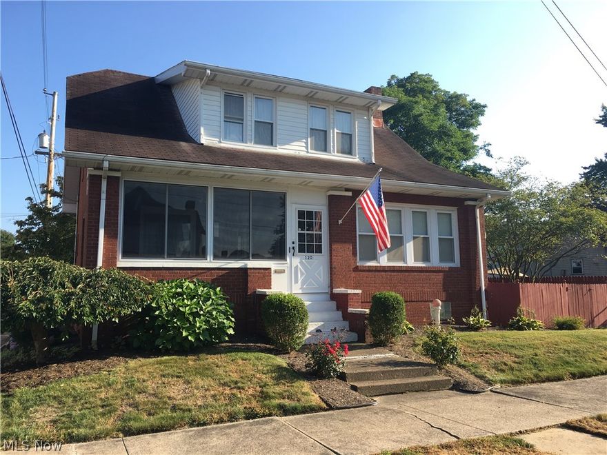 Very nice and well cared for brick home on a corner lot.  This home offers a large living room with gas fireplace, an office / den with built in book cases, beautiful formal dining room, kitchen w/breakfast bar and newer stainless steel appliances and 1/2 bath are on the main floor.  3 bedrooms upstairs including a master with his/her closets and remodeled full bath. Enclosed front porch/room great for relaxing. Some newer flooring and mostly newer paint and fixtures over the past couple years. The outside offers a fenced yard with a covered deck/patio area and a 22'x25' 2 car detached garage with concrete driveway. Seller offering a 1 year home warranty from APHW. A must see!