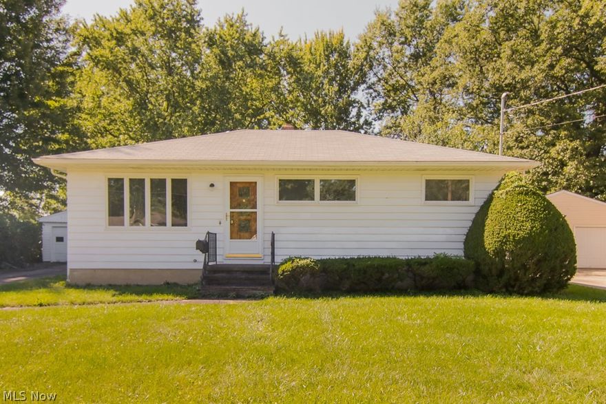 Welcome home to your freshly painted inside and out, 3 bed, 1 bath ranch. Step right in to your spacious living room with hardwood flooring and large picture window. Down the hall you will find your 3 bedrooms with hardwood floors, and main bathroom. Off the living room you will find your eat-in kitchen with large picture window looking out back to your .43 acres of yard! Full basement has been freshly painted. Many updates include Electrical 2017, Roof 2014, Furnace & A/C 2014, Whole house painted inside and out 2018, and 2 Car Garage painted 2018. Close to major highways, shopping and dining! Call to schedule a private tour today!