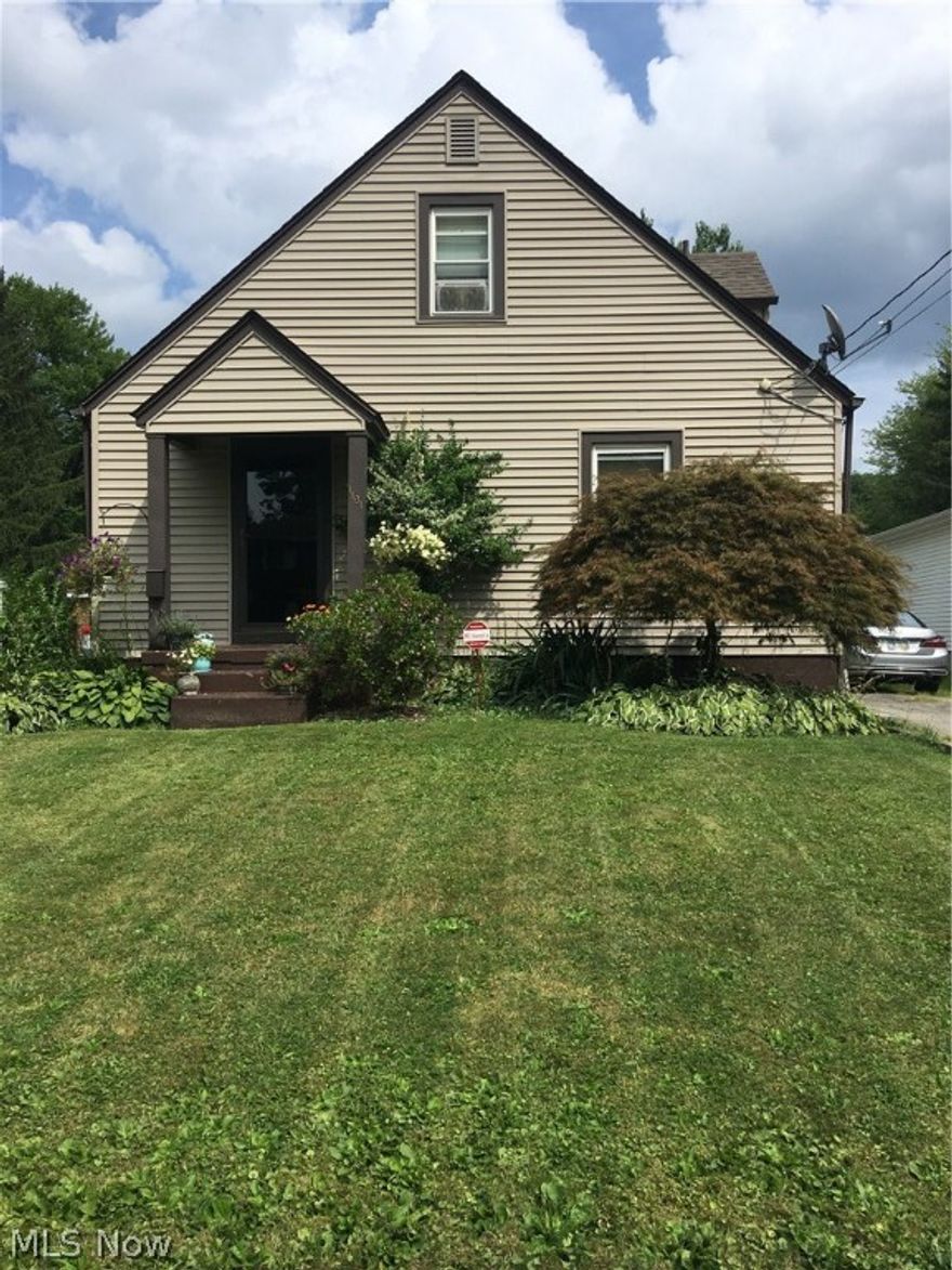 Buy this home with NO money down using the City of Warren Home Ownership Loan Program!  This is a super cute cape cod with many updates.  This charming cape offers 2 first floor bedrooms, a full updated bath,  and eat in kitchen with hard wood floors. There is a 2 car attached garage with breezeway/mudroom.  The garage also has access to the large deep back yard with new patio area.  The upstairs has a large bonus room with built in Kraftmaid  cabinets and a 3rd bedroom.  This area is used as a family gaming room now but could also make a nice master suite/nursery area. Some of the updates include:  furnace and central air about 6 years, newer vinyl tilt in windows, and a newer roof.  Garage and mudroom are also newer additions to this lovely home.  The basement was already waterproofed when current owner purchased the home.  CALL TODAY to find out how YOU can qualify for $5,000 toward down payment and closing costs!!