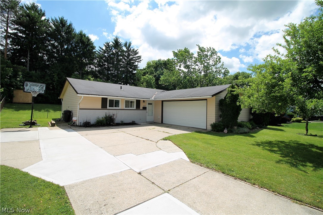 Welcome home to this charming three bedroom, one full and half bath ranch home. Everything on one level! Come on in from the matured landscaped front yard into the living room, half bath, and eat in kitchen area. The large stunning kitchen offers an abundant of new cabinets, new counters and new backsplash. There are three bedrooms and a full bathroom. The large gorgeous backyard offers a covered deck, new landscaping, updated Koi pond and a firepit area. Plenty of room for entertaining, relaxing etc. There is a two car attached garage and shed. Some updates include hot water tank (2018), washer (2019), newer windows, furnace just serviced and checked. New carpet will be put in this month - June. So many precious memories begin right here!