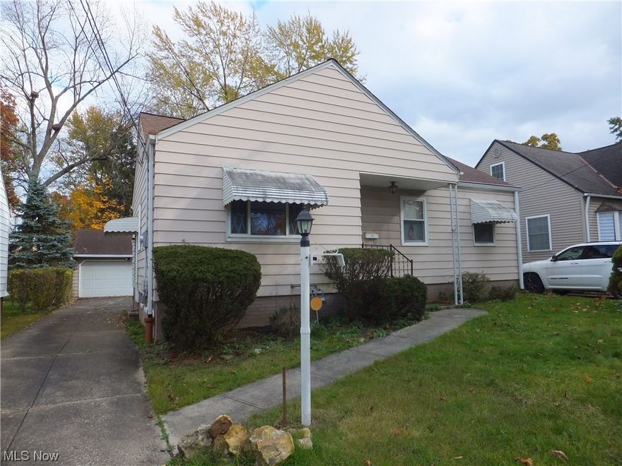 Parma Heights Aluminum Sided Ranch, 3 bedrooms, 2 full bathrooms, eat in kitchen w all appliances staying. hardwood floor, new furnace and central air, finished rec room w/dry bar, washer & dryer stays, deck, 2 1/2 car garage w/opener, nice sized 50 x 248 lot.