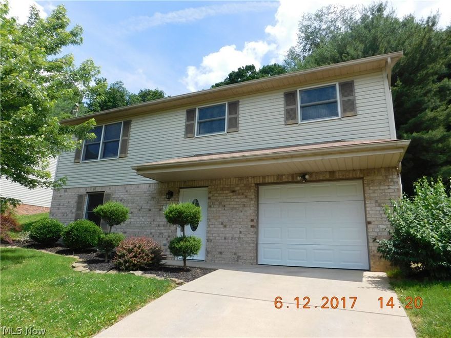 Fall in love with this Brick/Vinyl Beauty built in 1995 consisting of 1315 sq ft living space. New Roof, Central air unit, Hot water tank, Carpet, Paint, Front door, Garage door and more!   There are 3 bedrooms: Large Master bedroom features 2 closets and closet organizer, additional bedroom on first level with 3rd bedroom on lower level that leads to a bonus room which could be turned into a large walk-in closet/ office/ craft room..so many possibilities! 
~ Immediate Occupancy in this Move-In-Ready Home
Located approx. 35 miles from Pittsburgh International Airport