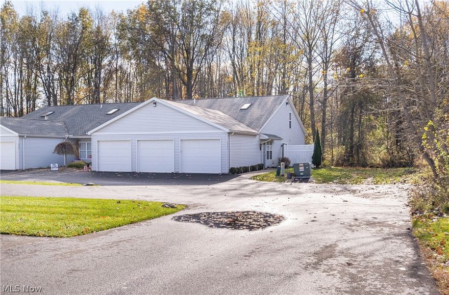 Custom-built condo in Lake Pointe III has features not typical in Bazetta Twp neighborhood and is located along wooded area.  Spacious and open floorplan.   Many upgrades include extra sound proofing on interior common wall & upgraded electrical & lighting. Great room w/ surround sound wiring in walls plus ceiling fans.  Hardwood floors run from great room and dining room into first floor master bedroom.  Vaulted ceiling in MBR w/ huge walk-in closet + second closet & 2 ceiling fans. Kitchen open to great room w/ wood cabinets, nickel hardware, stainless appliances (w/ waterline to fridge) & breakfast bar. Utility room adjoins the kitchen with stacked washer & dryer plus laundry sink.  Separate pantry with many shelves provide more-than-normal storage and has access from hallway; pantry is not a walk-through to get to another room, so the entire space is available for storage.   The second floor has a second full bath and bedroom which is completely enclosed for privacy.  The open loft