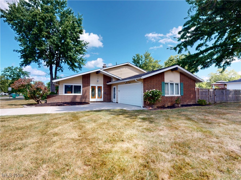 Welcome to this stylish split-level home featuring a new open-concept kitchen with vaulted ceilings and sleek finishes! Upstairs you'll find bright and airy living spaces with three bedrooms and full bath. The lower level offers flexible space perfect for a family room, home office or guest area with a half bath. Brand new couch was delivered and never used which can stay! Step outside to enjoy a spacious and private backyard ideal for entertaining or relaxing evenings. With its many updates and a versatile layout, this home is ready to welcome its next owner! Schedule your private showing today!
