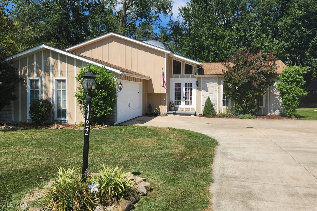 This beautifully maintained 4-bedroom, 2-bath home offers over 2,000 sq ft of versatile living space, a 2-car attached garage, and thoughtful updates throughout. Nestled in a desirable neighborhood, it blends comfort, charm, and functionality.
Step into a bright, open main level with a seamless flow between the living and dining areas. The living room features new carpet and large picture windows for abundant natural light, while the dining area boasts rustic vinyl flooring. The cozy kitchen offers ample cabinetry, included appliances (dishwasher, range, microwave, refrigerator), and access to the back patio, perfect for morning coffee or evening gatherings.
Upstairs, you’ll find three spacious bedrooms and a remodeled full bath with skylight ceiling, Jacuzzi tub, and walk-in shower—a true spa-like retreat! The lower level hosts a welcoming family room with wood-burning fireplace, fourth bedroom, and second full bath, ideal for guests or multi-generational living. The finished basement adds even more space with a built-in bar, rec room potential, and a dedicated laundry area.
Major updates include a newer roof (2018), custom-made newer windows, and a newer driveway (2018) for peace of mind. Seller will offer credit for AC; portable units included(4). Square footage per previous listing.
With its updates, flexible layout, and established location, this move-in ready home is perfect for everyday living and entertaining. Schedule your private tour today, this one won’t last
