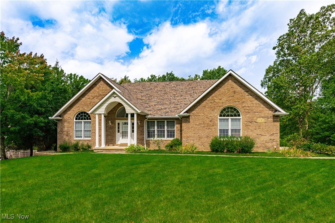 Welcome to this solid custom-built 4-bedroom, 3.5-bath home tucked away on a quiet cul-de-sac street in beautiful Walton Hills. With over 3,772 sq. ft. plus a 2,049 sq. ft. finished walkout basement, this property offers exceptional living space in a serene setting near the Cleveland Metroparks. The main level features a dramatic living room with vaulted ceilings that opens to the spacious eat-in kitchen. A formal dining room provides the perfect space for hosting. The first-floor master bedroom is wheelchair accessible and shares a full bath with the second bedroom—an ideal layout for family, guests, or multi-generational living. A half bath and first-floor laundry room add to the home’s convenience. Upstairs, you’ll find two additional bedrooms and another full bath. There is a walk-in attic for additional storage. The finished walkout basement expands your living space with a large recreation room, plus a storage room and workshop area. Recent updates include a new roof, furnace, and central air conditioning (2024), offering peace of mind and efficiency for years to come. Plus, with no HOA, you’ll enjoy the freedom of homeownership without added restrictions. Nestled in a community that feels like the countryside, yet remains close to freeways, shopping, and dining, this home strikes the perfect balance of peace, convenience, and accessibility. Families will also appreciate the option of sending children to the highly rated Cuyahoga Heights School District. Don’t miss this opportunity to own a beautiful custom-built home in Walton Hills—where comfort, updates, and location come together.