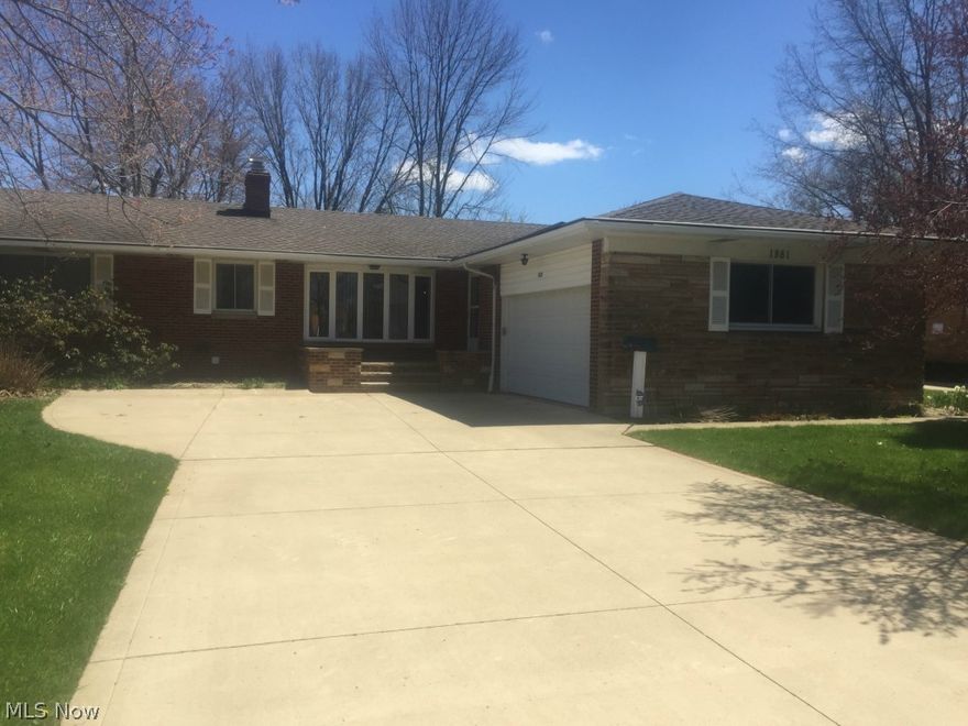 Beautifully cared-for 3 bedroom, 1 and 1/2 bath home that truly offers one-floor living. Amazing, ornate wooden door frames throughout. All 3 bedrooms are generous. Updated, large full bath with tile floor and a step-up shower/tub. Large kitchen with plenty of counter space and cabinets, with sliding doors that open to a large deck (29x26). Open living room and dining room, which are great for entertaining. Huge, partially finished basement with an abundance of storage. Hot water tank replaced 6/12. Large driveway with plenty of parking space and side-entry garage. Great value!!