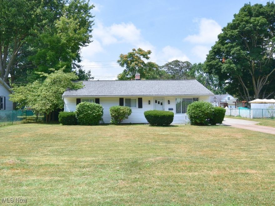 Welcome to this delightful 3-bedroom, 1-bath ranch nestled on a beautifully landscaped quarter-acre lot. This well-maintained home offers comfortable single-level living with thoughtful features throughout. Step into the light-filled living room that flows seamlessly into the dining area—perfect for entertaining or quiet evenings at home. Sliding glass doors lead to a bright and airy sunroom, a perfect spot for morning coffee or relaxing with a book. The kitchen offers ample cabinet space and easy access to the main living areas. One of the three bedrooms features a convenient Murphy bed, allowing you to maximize space and flexibility for guests, a home office, or hobbies. The backyard is ideal for gardening, play, or simply soaking up the peaceful surroundings. Schedule your showing today!