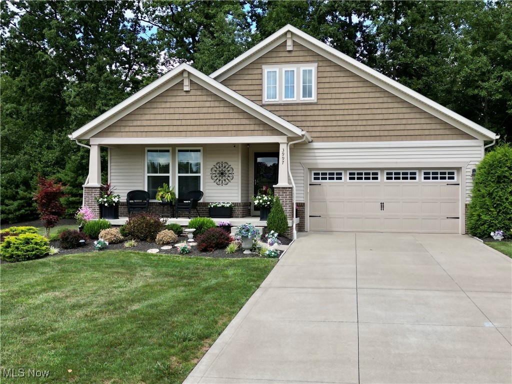 This home offers more than just beautiful landscaping and inviting curb appeal. With three bedrooms and three full bathrooms, this property combines comfort, functionality and style.
The heart of the home features an open kitchen and living room, creating a seamless flow ideal for both everyday living and entertaining. The primary suite offers a spacious retreat with its own attached full bath, providing privacy and convenience. Two additional bedrooms are located on the opposite side of the home, each with easy access to a full bathroom, making this layout perfect for family.
The finished basement adds incredible value with a large recreational space, bar area, full bath and a versatile bonus room, perfect for a home office, playroom or guest space.
Outside, the property showcases a meticulously maintained landscaping, enhancing the home's charm and welcoming atmosphere. The home is also situated in a convenient location, close to shopping and dining.
This well cared for home is move in ready and designed to meet a variety of lifestyle needs. Don't miss your opportunity to make this beautiful home yours -- schedule your private showing today!