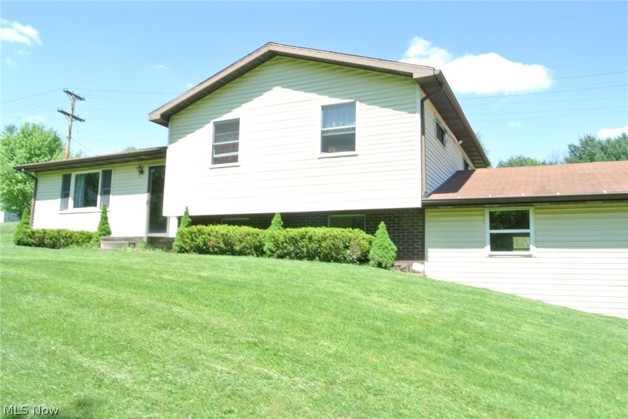 Immaculate home with a wood view. Spacious lot. New carpet installed May 2019. What a location - just minutes from the lakes and minutes to St. Clairsville. This home features a large rec room, new carpet throughout. Basement is plumbed for a second bath. Wood burner is connected to central heating system. Small town life; big town conveniences. Don't let this one slip away!