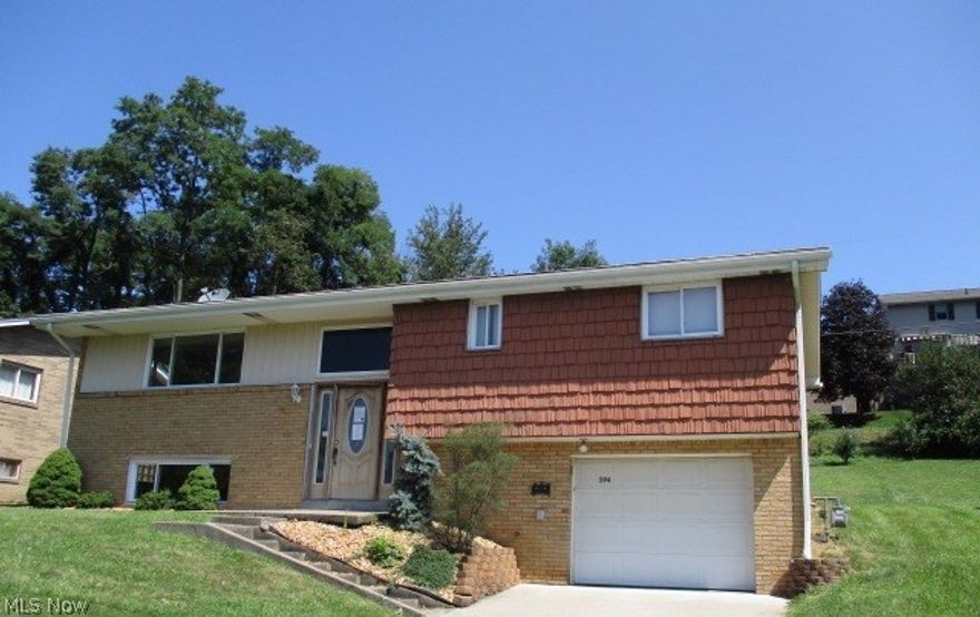 3 BEDROOM BRICK SPLIT ENTRY HOME WITH 3 BEDROOM AND 2 FULL BATHS.ROOF AND WINDOWS APPEAR TO BE UPDATED WELL MAINTAINED INSIDE .LARGE REAR PATIO OFF KITCHEN ON REAR .FULL BATH IN BASEMENT OFF OF REC ROOM ALSO LAUNDRY OFF REC ROOM .