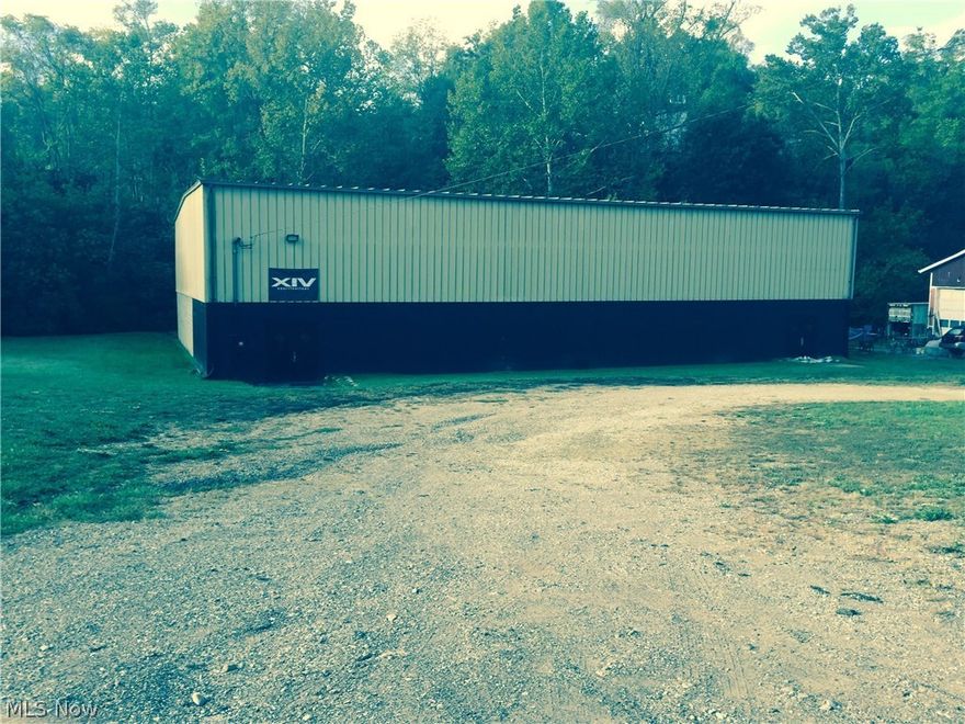 This property currently being used as a gymnasium.  The building is 70x100.  Primarily a basketball workout facility.  Can be connected for many useful things.