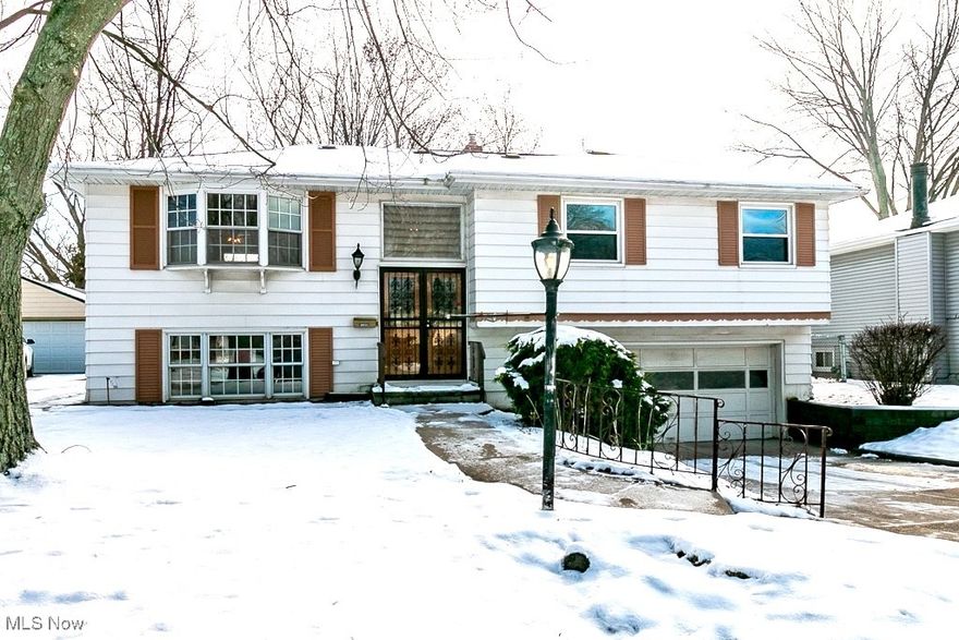 Welcome home to this charming 3 bedroom, 1.5 bath home in Eastlake, offering bright and functional living spaces. The open floor plan features a large living room that flows effortlessly into the dining area, creating the perfect space for entertaining or relaxing. The spacious updated kitchen includes all new stainless steel appliances, quartz countertops, and ample cabinetry and counter space. Three comfortable bedrooms are located on the main level and share a updated full bathroom. Entire home has new low maintenance LVP flooring throughout. The lower level offers a generous family room or flex space, ideal for a recreation room, home office, or gym, along with a utility room for added storage and an updated half bath. Step into the enclosed porch to enjoy peaceful views of the large fully fenced backyard and patio. Additional highlights include a two-car attached garage and a shed for extra storage. Close to all amenities. POS compliant! This is the one!