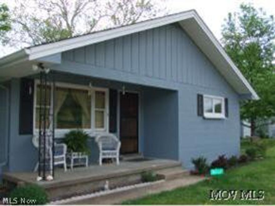 Year Round Vacation Home! You won't believe your eyes when you enter this home. It is much bigger than it looks! With a full attic and a huge sun-room, there won't be any space problems here. Great views of the Muskuming River. River Home. Seller may do owner finance with 20% down payment and acceptable credit and income.