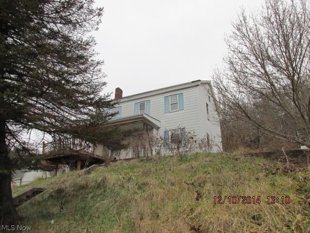 Large 2 story home with a covered front porch. Located in town and close to all local amenities. Lawn and landscape are maintained.