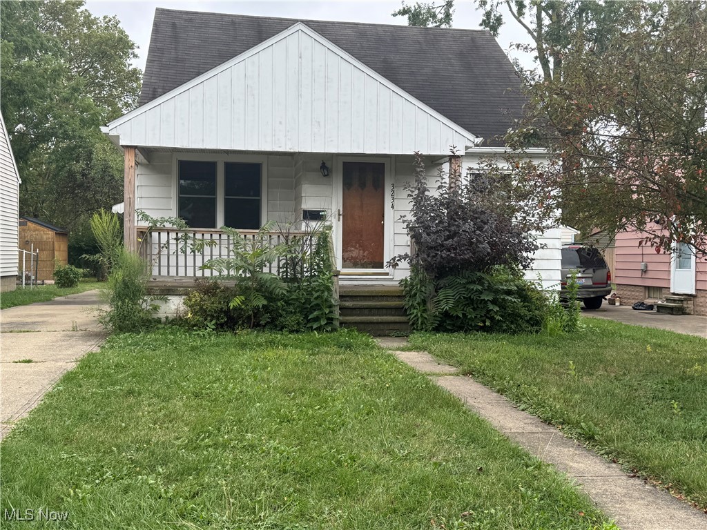 This affordable home offers newer attractive white kitchen cabinets, room to dine in the kitchen, and easy to clean vinyl flooring. The living room and the 2 first floor bedrooms boast gleaming oak hardwood flooring that was refinished. The 2nd floor bedroom is spacious offering plenty of room for loads of furniture. The basement is partially finished and offres a full bathroom with a stand up shower. You'll love the convenience of a 2nd full bathroom. The furnace was new in 2020, and the electric panel is newer with room to add more breakers. The windows are vinyl replacement. The concrete driveway is much easier to park on, and walk on during inclement weather than a dirt driveway or a gravel driveway. You'll love the living space this home offers, and don't forget the finished space and recessed lighting in the basement.