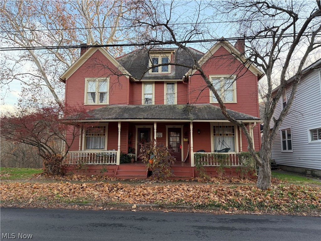 Victorian Duplex with cozy front porches.