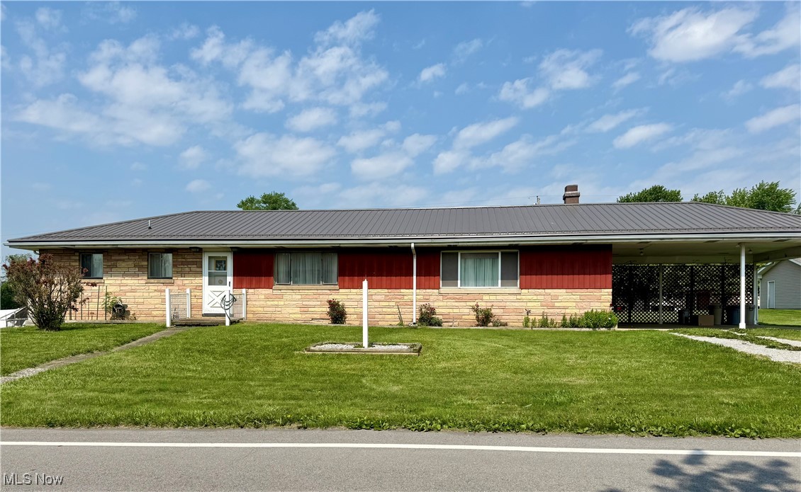 Enjoy easy one-level living in this 3 BR, 1 Bath home on a completely flat 3-lots near Highland Hills. You’ll love the spacious family/living room addition with fireplace. All appliances stay and the kitchen features a breakfast bar. This home includes hardwood floors, a newer metal roof and a 1- car attached garage and a 2-car carport.
