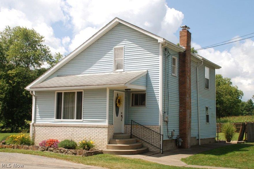 Updated charming home on 2 level lots, which allows lots of extra room. To add to the charm, there is a small creek running through the property. 2 Bedrooms with loft area which could work as a possible 3rd Bedroom. 2 car large detached garage with small wood burner and additional storage. Property is close to town, but offers privacy. Some updates include: newer windows, newer roof (6 yrs old), 1st floor laundry, and many cosmetic updates. Appliances STAY washer/dryer new in Jan 2015. Large white pantry in kitchen also stays with property. Sellers never used fireplace, no guarantees on working condition.