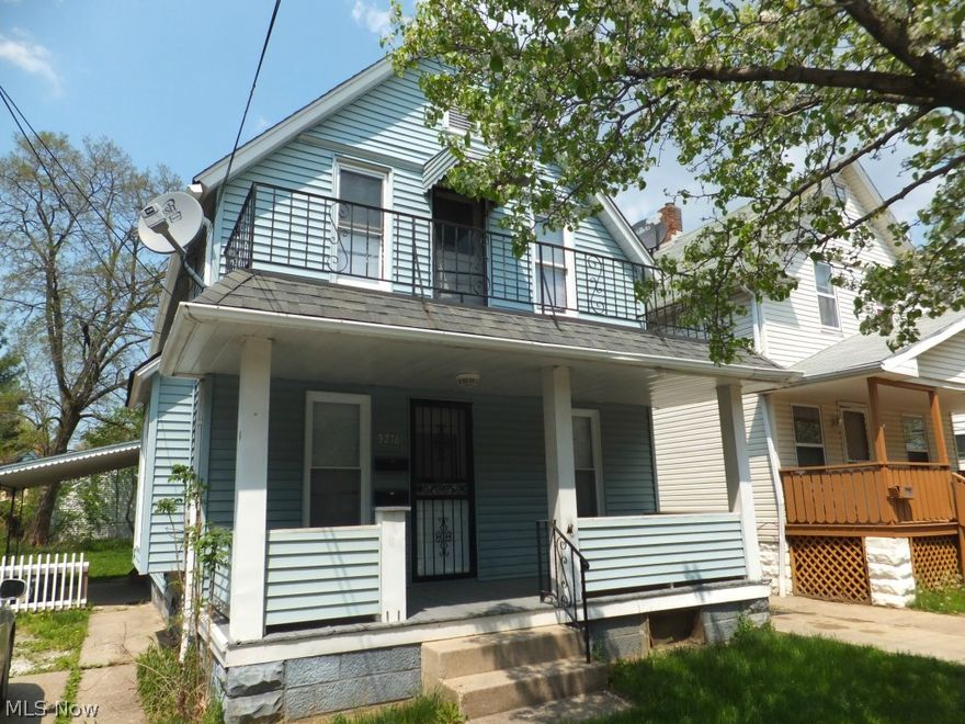 Vinyl sided 2 family,updated 100amp electric boxes,glass block windows,sold as-is