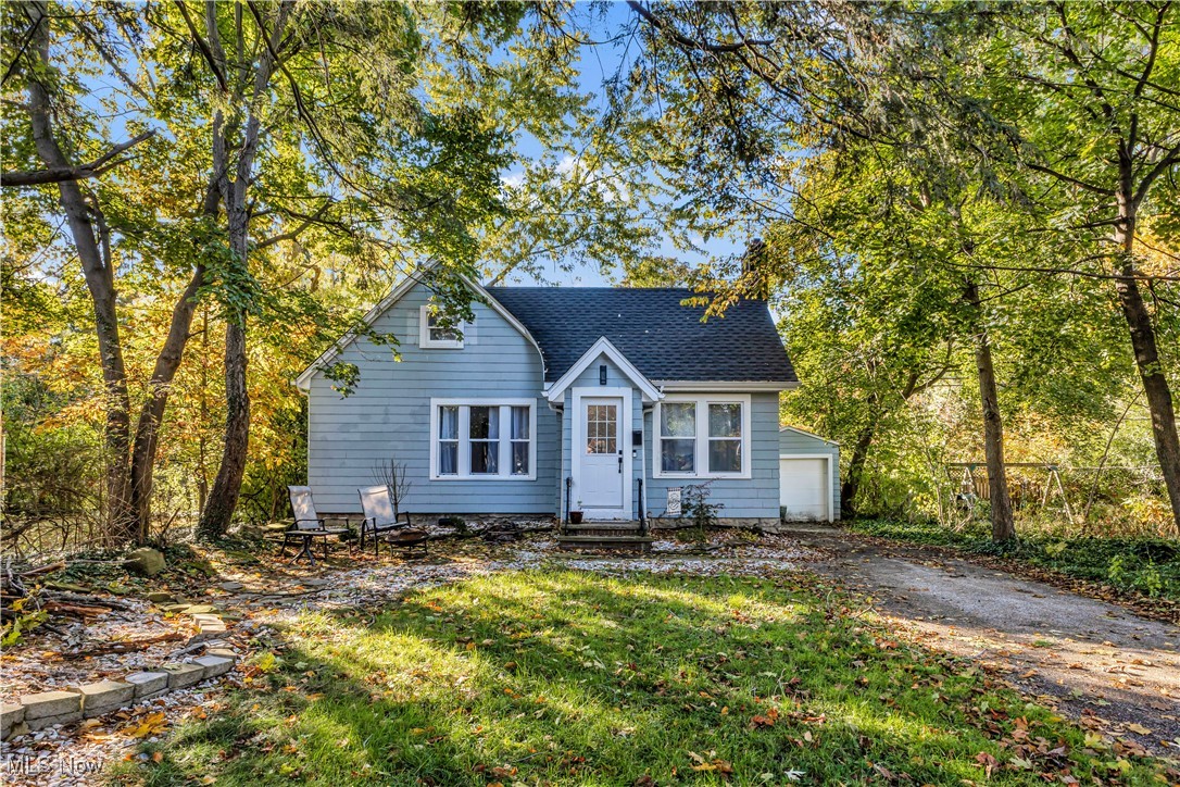 Welcome to your storybook retreat in Cleveland Heights! This cozy 2-bedroom, 2-bath cottage is tucked back off the road, offering the perfect mix of privacy and charm. Step inside to to a warm and inviting living space with a fireplace perfect for chilly evenings or quiet mornings with coffee. The home features a comfortable layout that feels both open and intimate, ideal for relaxing or entertaining. Whether you're a first-time buyer or simply looking to downsize into something special, this hidden gem combines comfort, convenience, and character-all in one perfect Cleveland Heights location.