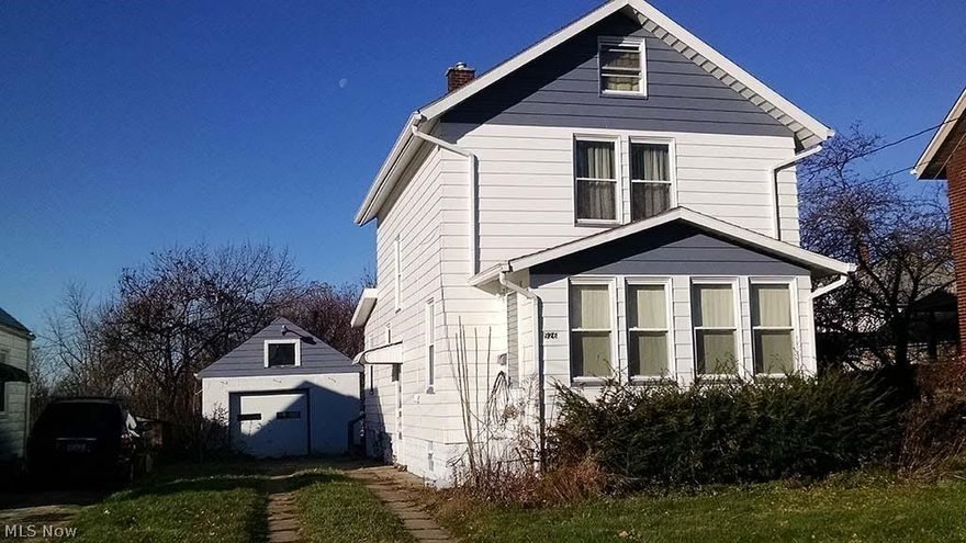 This Girard home is on a quiet residential street. The home has a newer roof and windows. In 2008 the home was remodeled with a renovation to the kitchen and upstairs bath and an addition on the west side of the home. The addition includes first floor bedroom/office space, a laundry and full bath with walk-in shower. The fireplace is enhanced with built-in case work.  The dining room is also spacious giving the lower level of this well-cared-for home an open-plan feel.