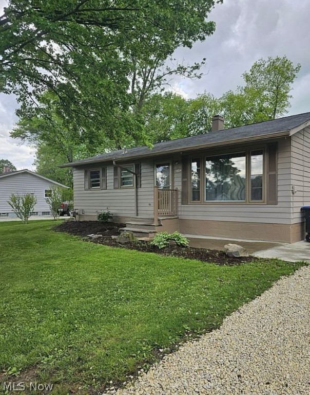 Move right in to this beautifully remodeled ranch! This home has 4 bedrooms plus 1.5 baths. The 4th bedroom can be used as a bonus room, office or a large Master. The home has been freshly painted and new flooring throughout. A fabulous new kitchen including new cabinets, granite counter, garbage disposal and all new stainless steel appliances. A large family room sits in the back of the house and leads to a fenced in back yard. The basement is partially finished and adds an additional 500 sq.ft. to the living space. Laundry hook ups are downstairs with a new utility sink. Brand new basement windows and sump pumps. Newer furnace and electric hot water tank. All plumbing and electrical has been updated.