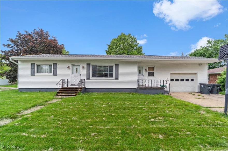 Welcome to 425 Warwick St – A Bright and Inviting Ranch in Akron! This beautifully maintained home offers over 1,500 square feet of comfortable living space with 3 spacious bedrooms and 2 full bathrooms. Step into the welcoming living room where large window bring in plenty of natural light, highlighting the peaceful white toned palette that creates a calm, inviting atmosphere. The kitchen is full of charm with light teal-colored walls, ample cabinetry, and a breakfast bar, all flowing effortlessly into the open-concept dining and living areas—perfect for everyday living and entertaining. A back door off the dining area leads to a comfy deck, ideal for relaxing or hosting guests. All three bedrooms are generously sized, and the main full bathroom is conveniently located on the first floor. The partially finished basement adds even more living space with a large recreation room, a second full bath, and a utility area for laundry and storage. Enjoy the screened-in porch that opens to the backyard, perfect for outdoor enjoyment. This move-in ready ranch is the total package—don't miss your opportunity to make it yours!