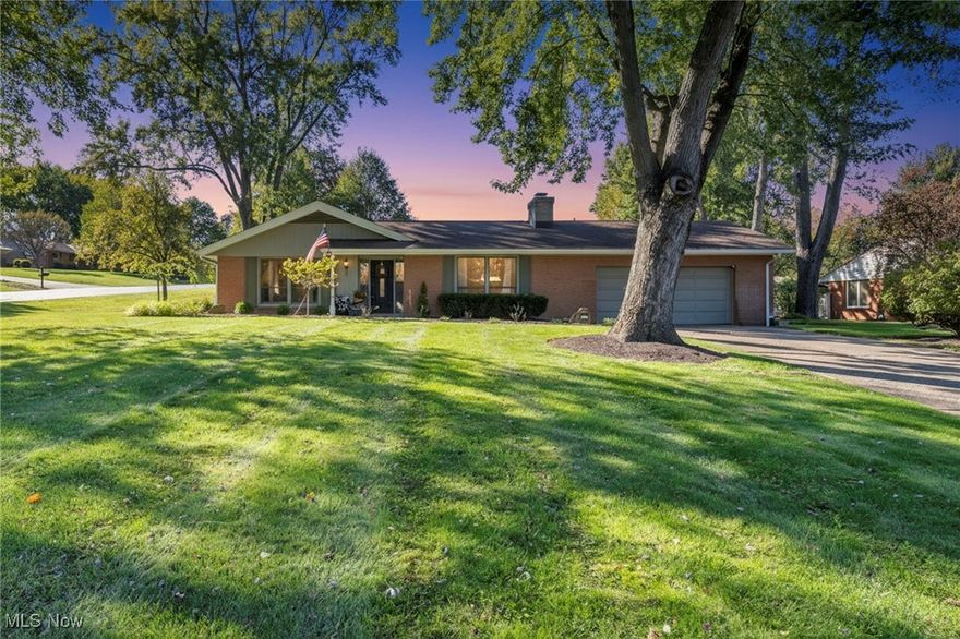 Some homes chase trends. This one tells a story. Welcome to 5225 Loma Linda Lane NE — a modern classic with soul. This rare 1950s ranch rambler is rich in character, showcasing vaulted ceilings with exposed wood beams, stunning chandeliers, and warm architectural details you simply can’t recreate. The living and dining spaces flow beautifully around a statement brick fireplace, while the kitchen embraces its classic charm with a cozy breakfast bar overlooking the main living area. The expansive primary suite feels like a private retreat with soaring beamed ceilings, and the finished lower level adds even more flexible living space. Outside, mature trees and a serene backyard offer a sense of calm and privacy. Once featured on HGTV’s The American Dream, this is a home for the buyer who values craftsmanship, space, and timeless design over passing trends.