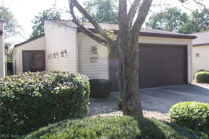 Located conveniently on Mills Road. Welcome home to this bright, spacious 3 bedroom, 2 full bath newly renovated condominium. The stylish interior has been repainted a warm,  neutral color with gorgeous clean, white trim. New durable, high quality floors in living room, kitchen, laundry room, both full bathrooms and carpet in all three bedrooms and hallways. Brand new kitchen countertops, garbage disposal and stainless appliances which are ready to be used for the very first time! Beautiful master bedroom with new French doors leading onto patio, spacious walk-in closet with plenty of storage and bathroom with tile and new vinyl plank flooring. Versatile, private, fenched outdoor space with little maintenance and a shaded patio that can be easily accessed from the kitchen, living room and master.  Central air and a high efficiency furnace. Attached two car garage with door opener and lots of additional storage. Owners have acces to the Mills Creek clubhouse, 4 pools, children's playground, basketball court, baseball field, tennis courts, walking track and exercise area, picnic area as well as various social functions and clubs held throughout the year. Desired location close to route 480, route 20 and Lear Nagel Road. Only minutes away from Bradley Creek Reservation, Hilliard Lakes Golf Club, shopping, dining, UH and Cleveland Clinic facilities and Lake Erie. Get a fully renovated home for a great price!