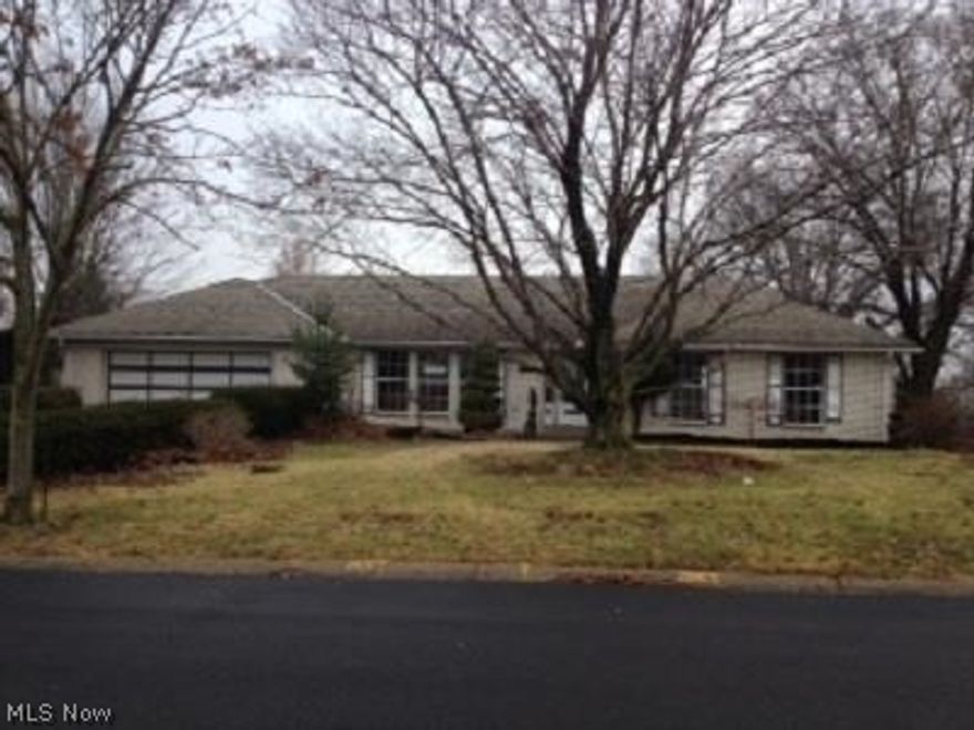 Large ranch home with 2 car attached garage.   2 full baths on first floor and 3/4 bath in basement.  Finished family room in walk-out basement with fireplace and bar.  Very large multi-level deck in rear.