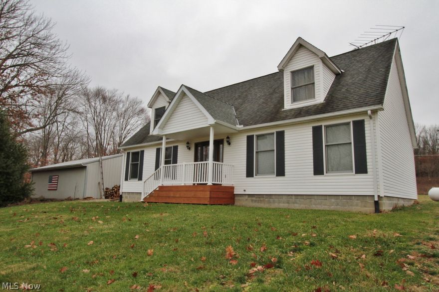 Well maintained home located just off SR 60- close to Dresden and Zanesville, situated on 2 acres and ready for new owners! This home has been well cared for, with many recent upgrades including :   Flagstone walkway, newer roof, French drains, downspouts, covered front porch and back deck, and new doors. Large oversized detached garage (864 sq. ft) is an added bonus! Tastefully decorated throughout- nothing to do but move in!