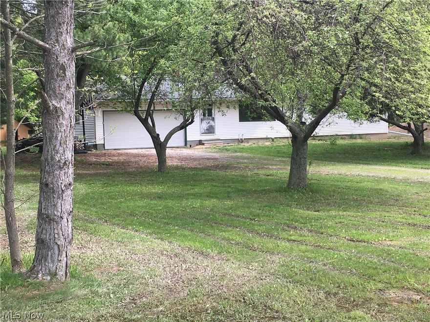 If acreage is what your looking for, look no further. This raised ranch of 3 bedrooms and 2 baths is seeking a new
owner. A little TLC will go along way with this one. This home comes with 4.3 acres and a lot of fun times to come. A
large Gazebo in the back yard is perfect for entertaining or just relaxing in this country setting. Hardwood floors are
through the living room and all the bed rooms. Hurry to make this home yours. Selling as is. Seller will make no
repairs. The potential is huge. Call today to schedule your appointment.