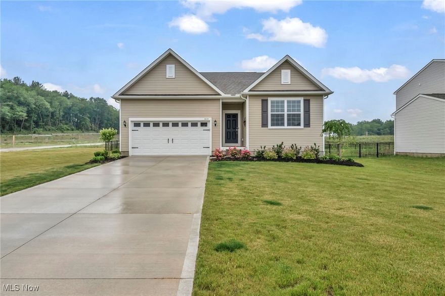 Newly built, move-in ready Ranch with many upgrades located on over .34 of an acre fenced-in property in the Mount Eaton Estates community just minutes to charming downtown Wadsworth. This thoughtfully designed home features an open floor plan with stunning kitchen with quartz countertops, tiled backsplash, upgraded cabinetry, and large island with ALL kitchen appliances included. The owners' suite has a walk-in closet and en-suite bath with double vanity and walk-in shower. Other highlights include a 1st-floor laundry room, attached 2-car garage, full basement with 9-ft ceiling and rough-in plumbing for a full bath, and a full fenced-in yard with irrigation system already installed. In addition to many builder upgrades, such as quartz countertops in the kitchen, LVP flooring, upgraded appliances and refrigerator, ceiling fans, crown molding, wainscoting, and much more, since moving in a fence was installed, Ring doorbell, and window treatments throughout. INCLUDED are kitchen appliances, the Ring doorbell, and all window treatments. Conveniently located near I-76, OH-57, shopping, restaurants, and many other local attractions. This home is a must see!
