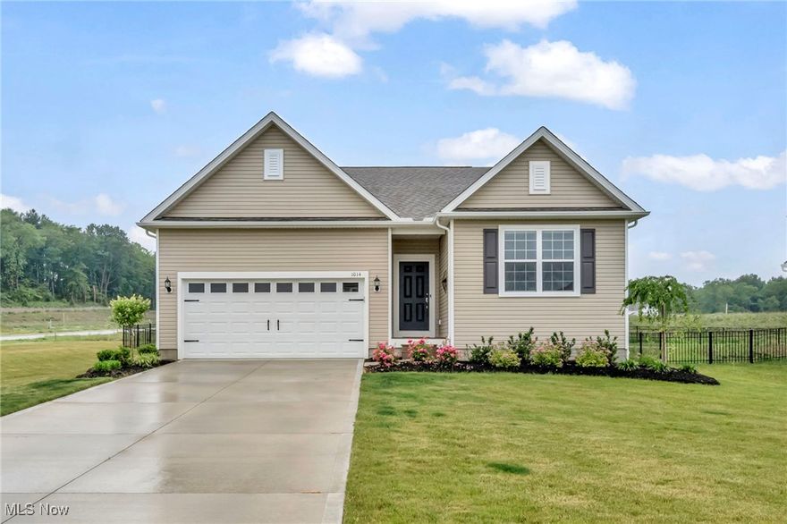 Newly built, move-in ready Ranch with many upgrades located on over .34 of an acre fenced-in property in the Mount Eaton Estates community just minutes to charming downtown Wadsworth. This thoughtfully designed home features an open floor plan with stunning kitchen with quartz countertops, tiled backsplash, upgraded cabinetry, and large island with ALL kitchen appliances included. The owners' suite has a walk-in closet and en-suite bath with double vanity and walk-in shower. Other highlights include a 1st-floor laundry room, attached 2-car garage, full basement with 9-ft ceiling and rough-in plumbing for a full bath, and a full fenced-in yard with irrigation system already installed. In addition to many builder upgrades, such as quartz countertops in the kitchen, LVP flooring, upgraded appliances and refrigerator, ceiling fans, crown molding, wainscoting, and much more, since moving in a fence was installed, Ring doorbell, and window treatments throughout. INCLUDED are kitchen appliances, the Ring doorbell, and all window treatments. Conveniently located near I-76, OH-57, shopping, restaurants, and many other local attractions. This home is a must see!