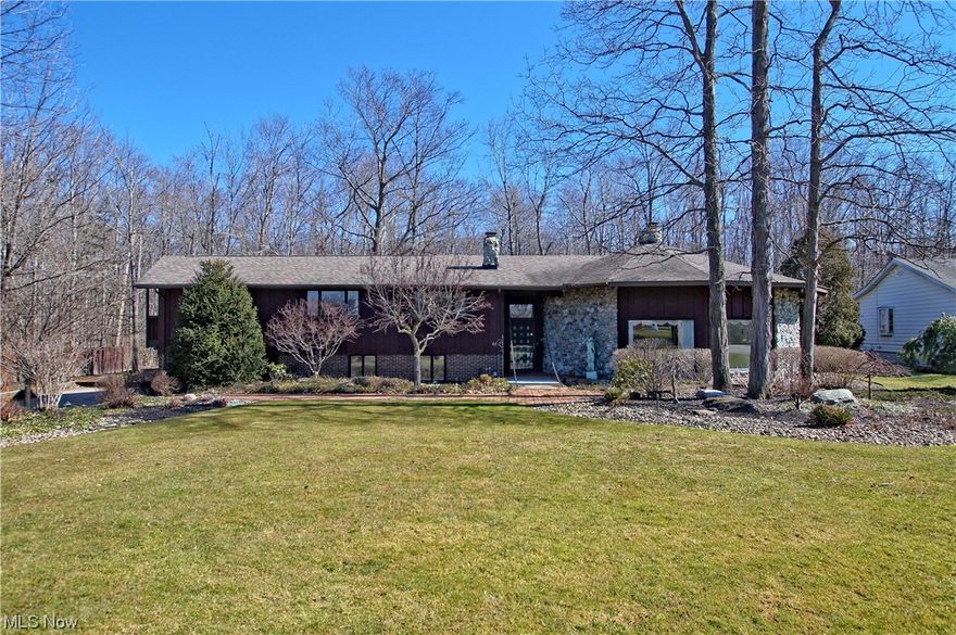 If you are tired of "Cookie Cutter Style" homes, then this beautifully landscaped Contemporary / Modern Home with an In-Ground Pool and Draw Bridge Entrance w/Koi Pond that backs up to The Metro Parks is waiting for you* This 3,900+ sq ft home features 4 Bedrooms and 3 1/2 baths* 2 Story Foyer w/ Stone Waterfall*  A Turret Shaped Living Room w/ 17' ceilings, windows galore and a two sided Floor to Ceiling Stone Fireplace* Dining Room* Eat-In Kitchen w/ Solid Surface Countertops, Built-In Appliances, Wood Flooring and a Slider to The Pool* Lower Level Family Room w/ Built In's and A Full Bath* Master Bedroom w/ Full Bath, Dual Vanities, Dual Closets and a Walk-Out Balcony*   2nd Bedroom Features a 1/2 Bath and its own Balcony* Lots of storage with a pull down attic and Basement* Zoned Heating and Cooling* Garage with Nature Stone Flooring* This house was made for the family that loves to entertain, so bring your HGTV skills and make it yours* Call for your private showing today*