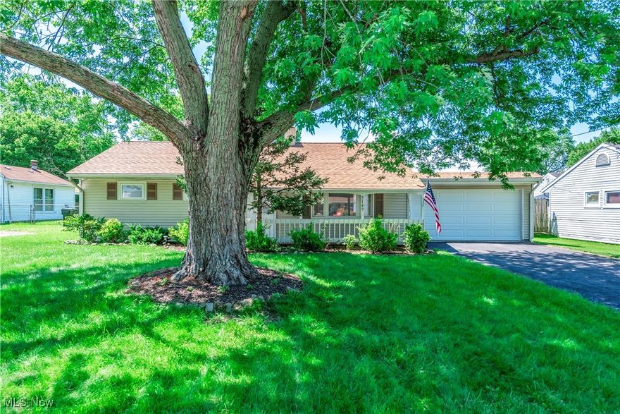 Check out this beauty! This ranch offers 3 bedrooms and 1 full bath.  It has some updates including: new roof (2025), new bedroom carpet and living room LVT flooring (2025).  Freshly painted interior!   Just imagine relaxing on your shaded, covered front porch! As you enter the front door you will appreciate the bright and airy feeling of the living room.  Steps from there you can reach the kitchen offering options for space and appliance locations.   There is a laundry/utility room just steps from the kitchen as a bonus!   Down the hallway you find 3 bedrooms, 2 with carpeting and one with tile floors.  This flex room can be bedroom, playroom or even dining room if additional space is needed.  The full bath is located in the front hallway for easy access from any of the bedrooms.   Once outside you find a back deck, large storage barn, a yard large enough for all your needs and as a bonus- it is fully fenced with a privacy fence!  The 2 car attached garage has room for a work bench and more!  The driveway was just resealed (2025) for added convenience.   Located minutes from the local pool, schools, playgrounds, lake and marinas!