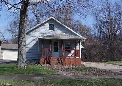 4-6 Bedroom Cape Cod with large addition for First Floor Master Bedroom and second Full Bath. 2 Bedrooms on the first floor, 2 on the second, and 2 finished "bonus" rooms in the basement.Roomy kitchen and adjoining dinette have laminate flooring. Three parcels make for a nice yard and privacy. Partially fenced back yard. Glass block windows, concrete drive, and shed. Rehab has been started. Your finishing touches make it your own. Master Bedroom addition has its own entrance to the outside and adjoining full bath, making it a possibility for a mother-in-law suite.
