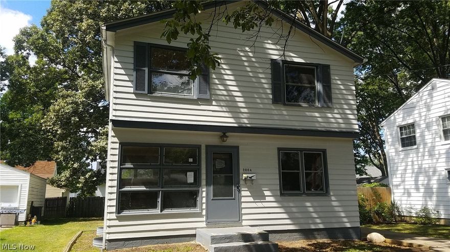 2 story colonial is a nice location in Cuyahoga Falls. Nice sized living room and kitchen to entertain all your guests. 2 car detached garage for extra storage.