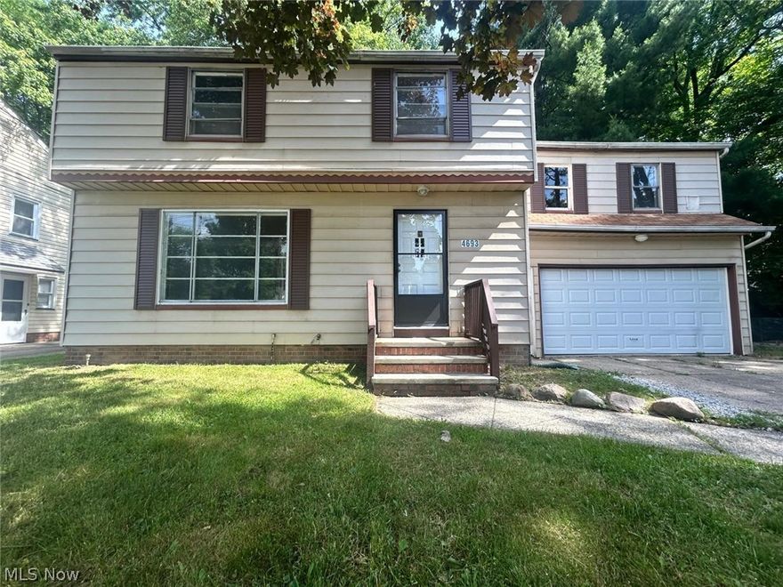 Traditional Colonial 4 bedroom one and half bath South Euclid colonial! The first floor has a large living room dining room, and the kitchen has an extra eating area! The upstairs has an extra large master bedroom over the attached 2 car garage, 1 full bath and your traditional 3 other bedrooms with beautiful hard wood floors that complement this lovely home. It even has a semi finished basement with a brick fireplace! This peaceful home will not be available for long!