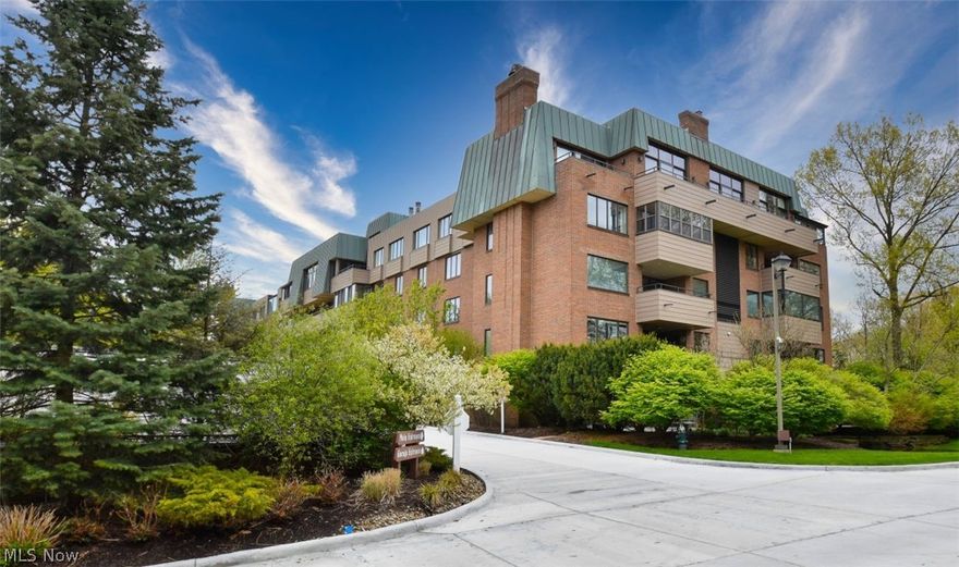 Experience pampered luxury blended seamlessly with everyday comfort in this beautifully maintained lower-level condo, where abundant natural light pours through numerous windows to create a warm and inviting ambiance. This spacious residence showcases true pride of ownership and features two generous bedrooms and two and a half baths, along with a stunning sunroom offering picturesque views. A formal foyer welcomes you into a large, inviting living room that flows effortlessly into the dining area, perfect for both relaxing and entertaining. The well-appointed kitchen boasts expansive stunning quartz countertops, ample cabinetry, and a charming breakfast area. Enjoy your own fabulous fully finished porch.The primary suite offers excellent closet space and a private bath, while the second bedroom is equally well-sized and complemented by an additional full bathroom. An in-suite laundry room provides added convenience and extra storage. Ideally located in the desirable Three Village community, residents enjoy direct access to Acacia Reservation with its scenic 1.7-mile paved loop trail, along with exceptional amenities including full time staff,  fully staffed gate house, 24 hour security, garage parking with garage attendants, a fantastic indoor pool, tennis courts, and beautifully landscaped grounds that create a serene, park-like setting. Nestled just minutes away from major highways and premier shopping and dining destinations, this residence offers a lifestyle of unparalleled sophistication and contentment.