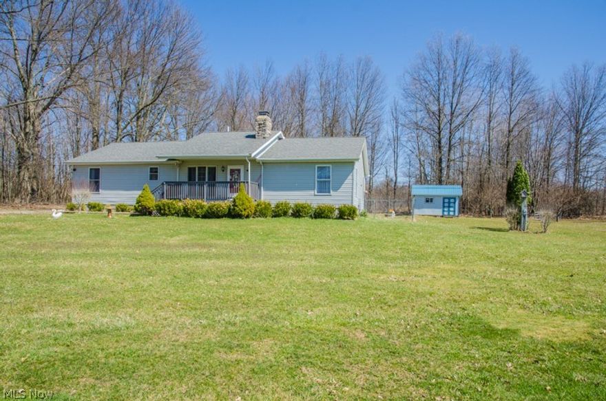 Want to have it all?  Looking for Privacy in the country… Welcome Home.    Custom built 1800 sq ft Ranch is set on 7.6 acres. This could be your own private paradise. With 3 Bedrooms & 2 full Baths, Living Room with Wood Fireplace,  Kitchen with lots of counter space and cabinets open to a eating area that looks out to your back deck.  French Doors open to an Office or could be a Formal Dining room.   Relax on your deck and enjoy the quiet.  Property features a Small pond, some woods and a farm field (farmed in 2018)  24 x 40 Building has 2 overhead doors, concrete floor, and an area for small animals. Separate Chicken Coop, Duck house, and 2 Sheds.  Perfect property for your own private mini farm.  Conveniently located near West Branch,  just South of Edinburg with easy access to I-76.