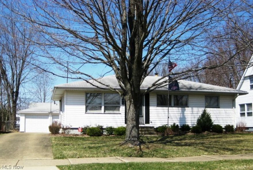 This home just shines!  Neat, clean, ready to move in 3 Bedroom 2 bath ranch.  Finished basement with awesome bar area.  Cement drive with turn-around or large patio.  2-car detached garage with large workshop or storage area. Vinyl sided and VERY well maintained. Lot size 60x128.