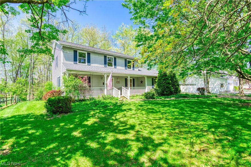 What a fabulous price for this two story colonial style home located in the North Canton school district!  Nestled in a gorgeous, private 1.23 acre homesite with a wooded view. Needs some updating which is reflected in the price.  Great floor plan, two story foyer, welcoming family room with bayed window, first floor laundry, owner’s suite has full bath with double sinks, whirlpool tub and separate shower, two car attached garage with an extra storage area. Full basement. Very nice curb appeal, relaxing front porch. Don’t miss this fantastic buy!