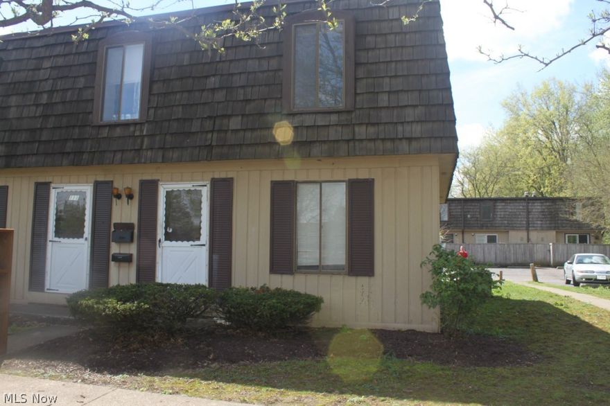 Banked owned two bedroom condo that awaits your personal touches.  End unit that faces the pond with a private patio.