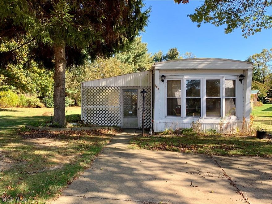 1983 Fairmont mobile home selling AS IS. Home sits on a large, beautiful lot in the corner of the street. Well taken care of and has a lot of kitchen space and a large living room. Plenty of storage space with the enclosed patio and shed out back!