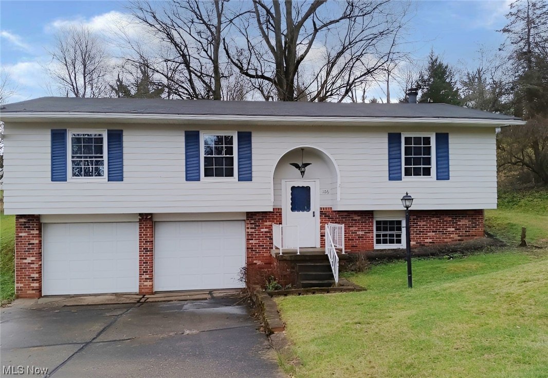 3 bedroom 1 bath split foyer with a lower level family room, laundry and half bath. The home sits on a nicely sloped lot with a 2 car attached garage and a nice back deck. Beautiful opportunity with this home. Call your Realtor today for your private showing.